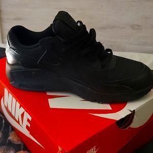Brand new all black Nike sneaker youth size 4